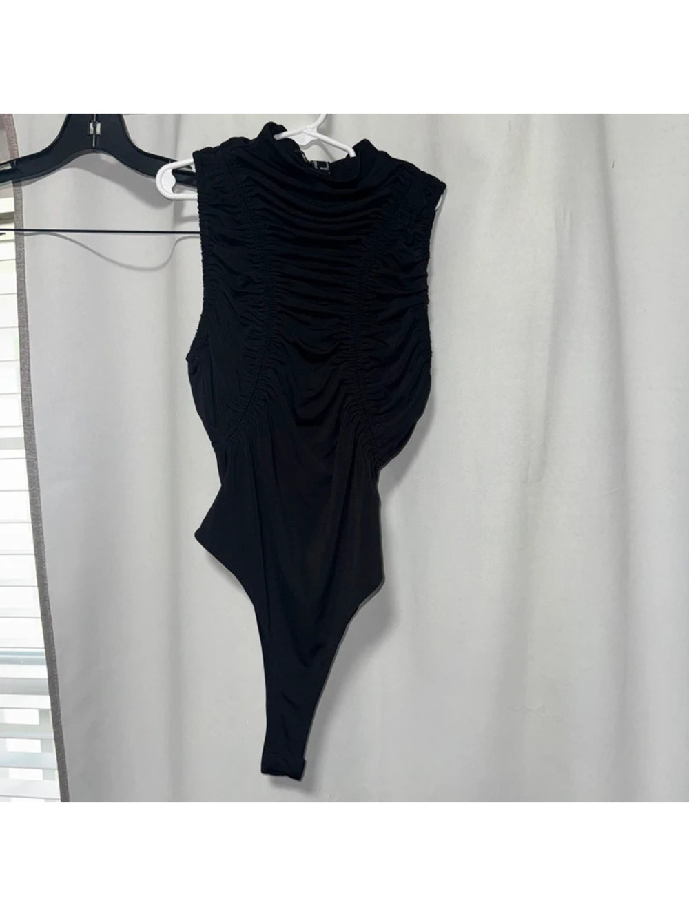 black sleeveless mock-neck bodysuit from Forever 21